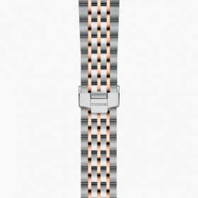 MONTRE TUDOR 1926 CADRAN NOIR LUNETTE OR ROSE