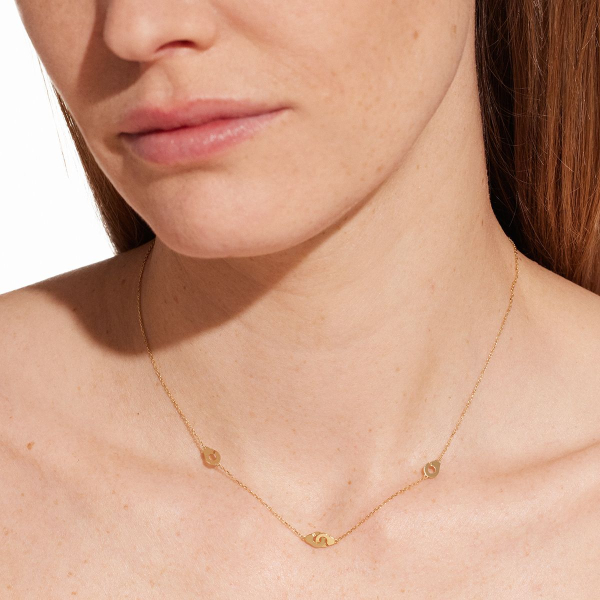 Collier Menottes Dinh Van R5 or jaune sur chaîne