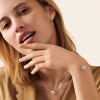 Bracelet Dinh Van Menottes R8 or blanc sur chaîne
