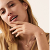 BraceletDinh Van Menottes R8 Or Rose sur chaîne