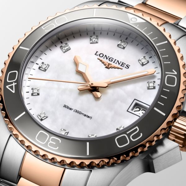 Montre Hydroconquest Cadran Nacre blanche Bracelet Acier et traitement PVD rouge