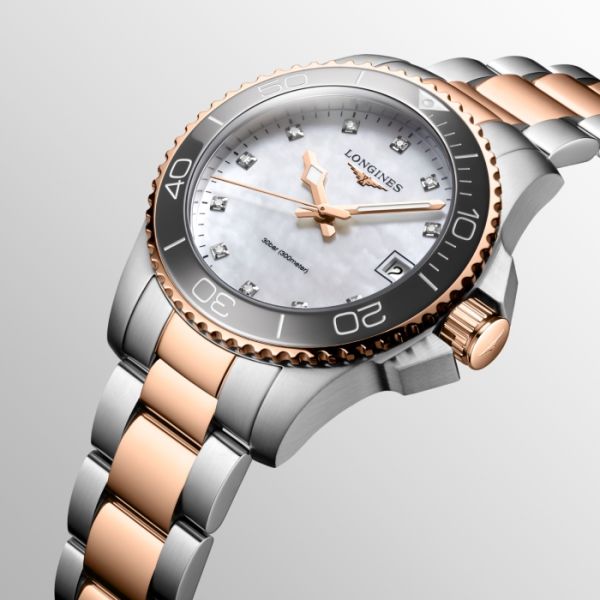 Montre Hydroconquest Cadran Nacre blanche Bracelet Acier et traitement PVD rouge