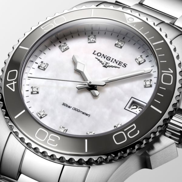 Montre Hydroconquest Cadran Nacre blanche Bracelet Acier et PVD jaune