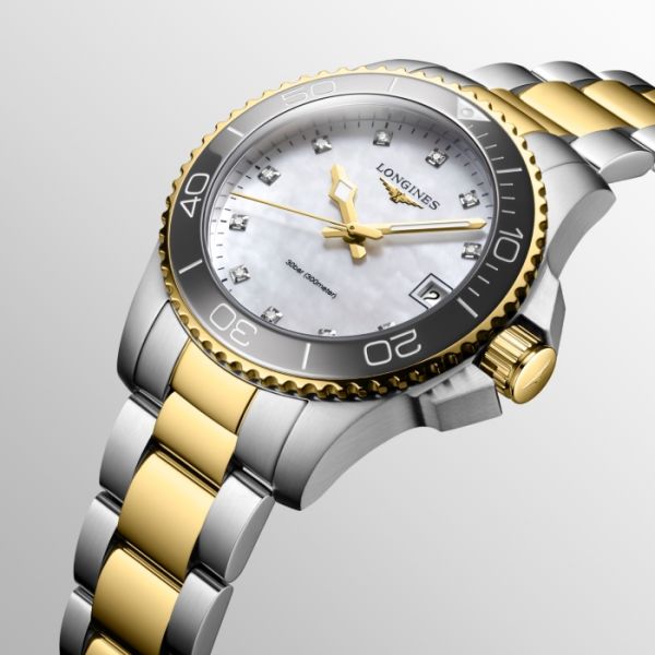 Montre Hydroconquest Cadran Nacre blanche Bracelet Acier et PVD jaune
