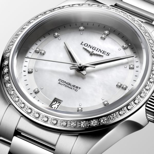 Montre Conquest Cadran Nacre blanche Bracelet Acier