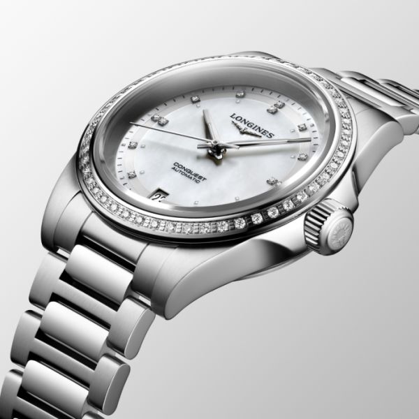 Montre Conquest Cadran Nacre blanche Bracelet Acier
