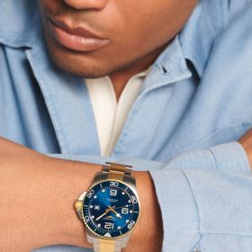 Montre Hydroconquest Cadran Bleu soleillé Bracelet Acier et PVD jaune