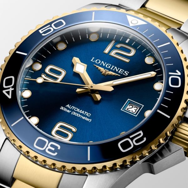 Montre Hydroconquest Cadran Bleu soleillé Bracelet Acier et PVD jaune
