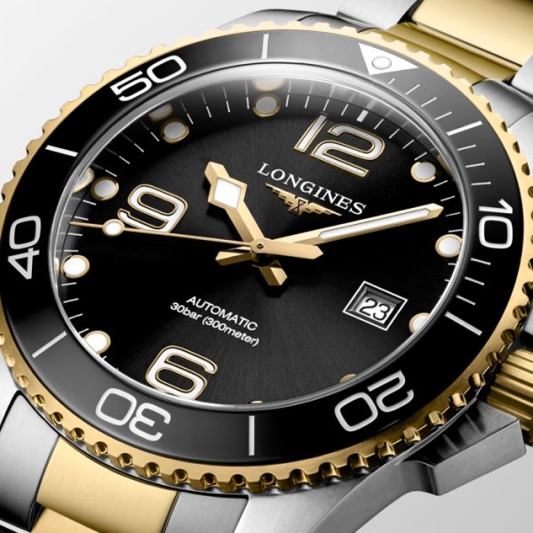 Montre Hydroconquest Cadran Noir soleillé Bracelet Acier et PVD jaune