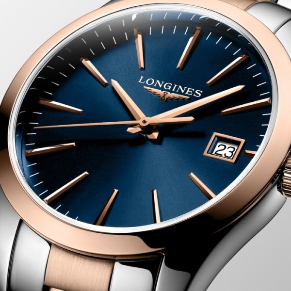 Montre Conquest Classic Cadran Bleu Bracelet Acier PVD rouge