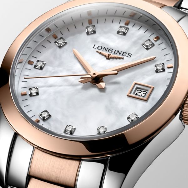 Montre Conquest Classic Cadran Nacre blanche Bracelet Acier PVD rouge