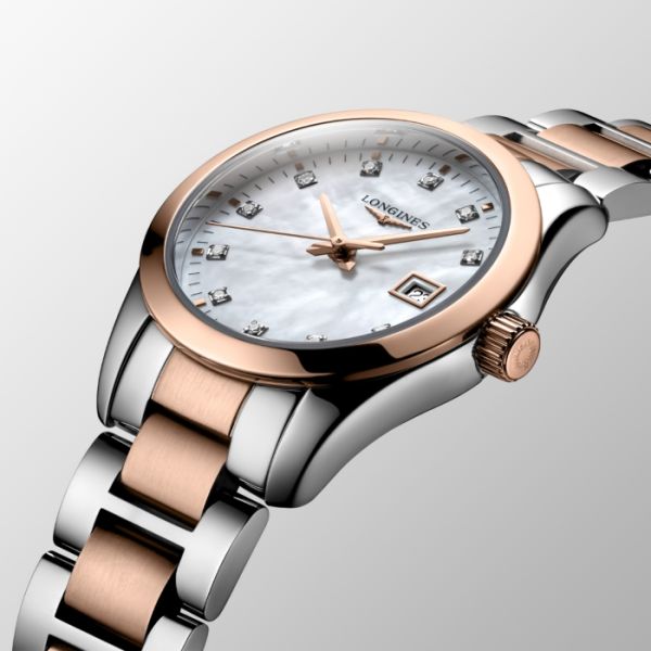 Montre Conquest Classic Cadran Nacre blanche Bracelet Acier PVD rouge