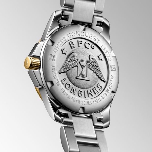 Montre Conquest Cadran Nacre blanche Bracelet Acier et PVD jaune