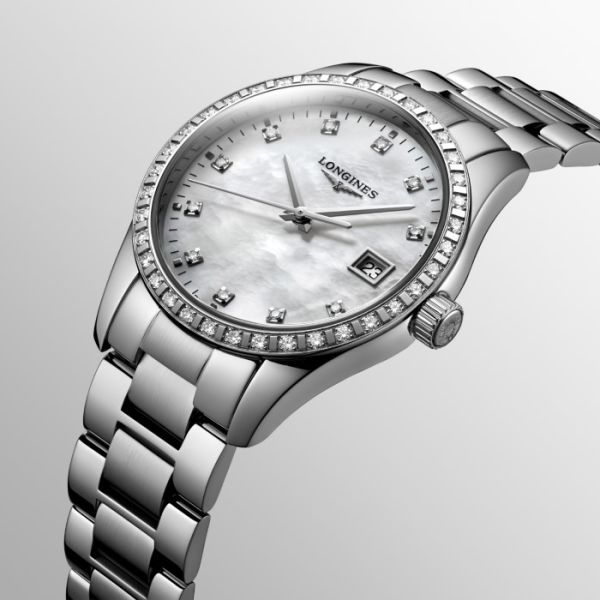 Montre Conquest Classic Cadran Nacre blanche Bracelet Acier
