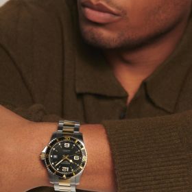 Montre Longines Hydroconquest Cadran Noir soleillé Bracelet Acier et PVD jaune