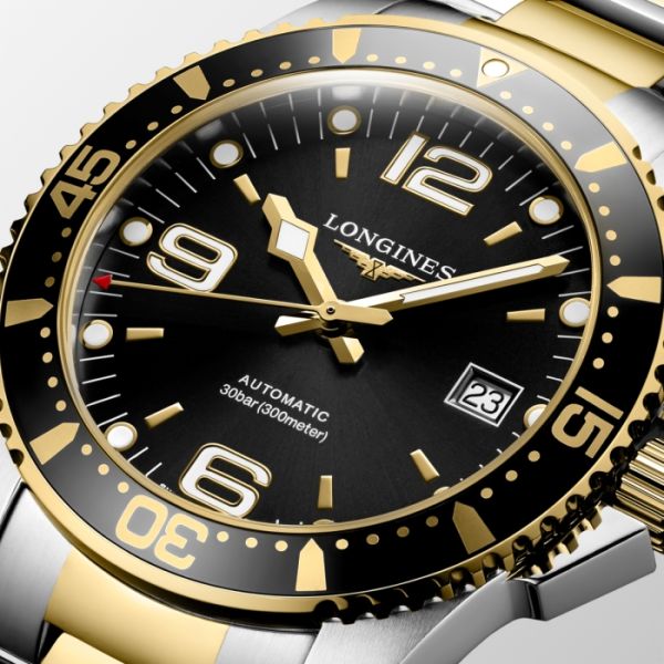 Montre Longines Hydroconquest Cadran Noir soleillé Bracelet Acier et PVD jaune