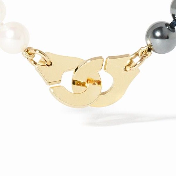 Collier Dinh Van Menottes Or jaune Moyen Modèle Perles et Hématites
