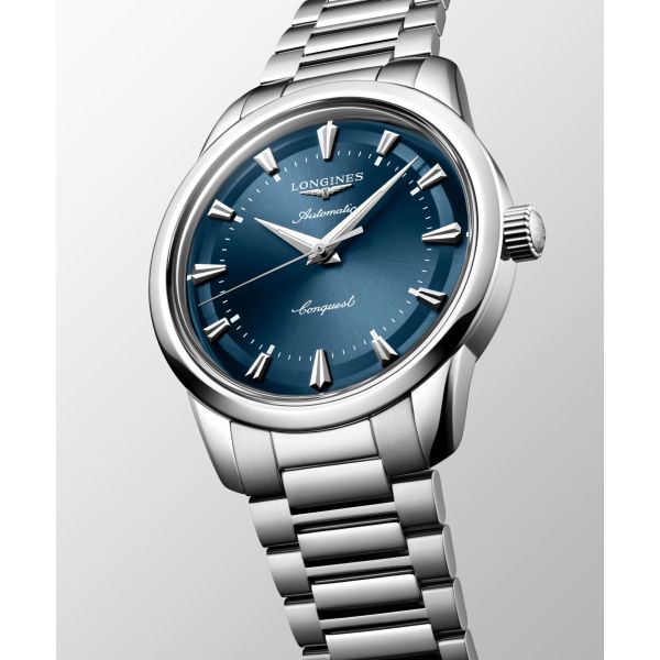 Montre Conquest Heritage 40mm Automatique Cadran Bleu laqué poli Bracelet Acier