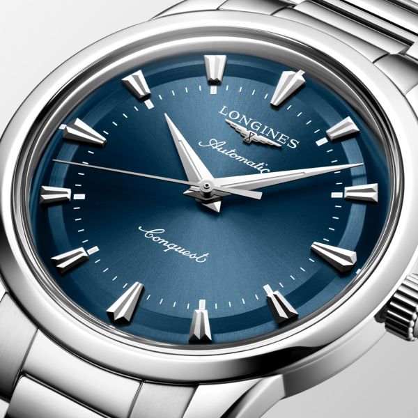 Montre Conquest Heritage 40mm Automatique Cadran Bleu laqué poli Bracelet Acier