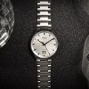Montre Mido Commander Big Date 42mm Cadran Argent Bracelet Acier inoxydable Gris