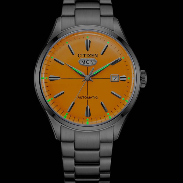 Montre Citizen Crystal Seven Mechanical Cadran Orange Bracelet Metal