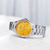 Montre Citizen Crystal Seven Mechanical Cadran Orange Bracelet Metal