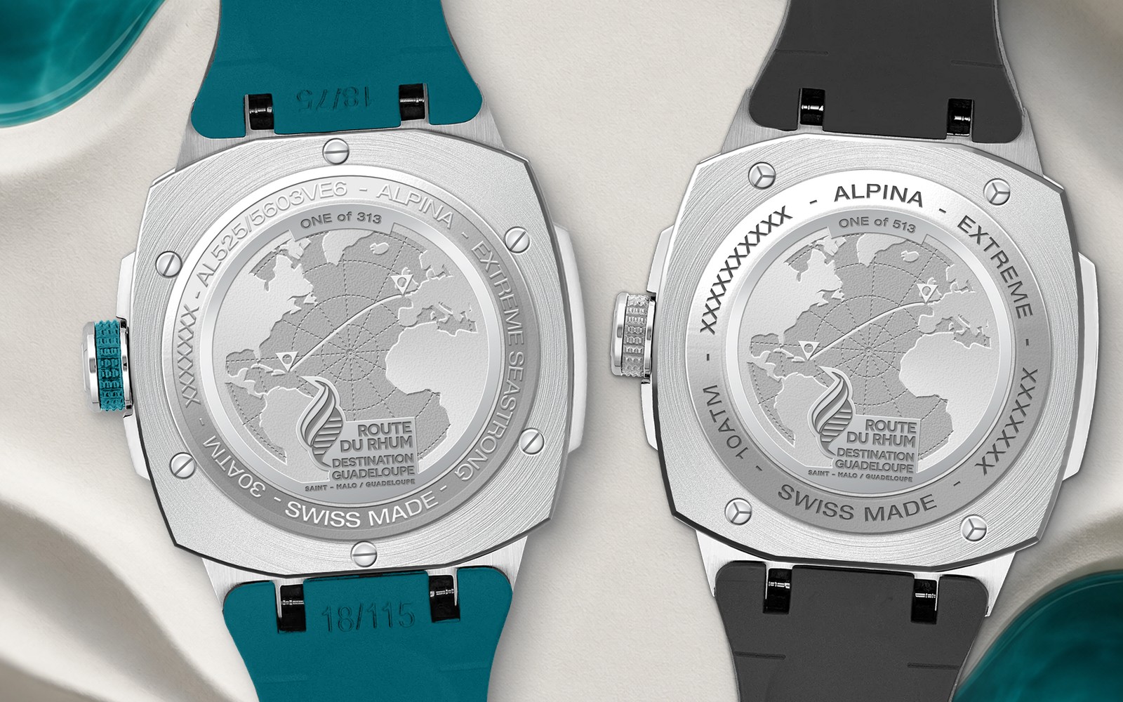 Alpina Seastrong Diver Extreme et Alpiner Extreme Solarmetre Route du Rhum vues de dos, fonds gravés de la carte de l'Atlantique Nord et du tracé Saint-Malo Guadeloupe, ONE of 313 et ONE of 513, sur un plateau blanc ondulé, vue d'illustration