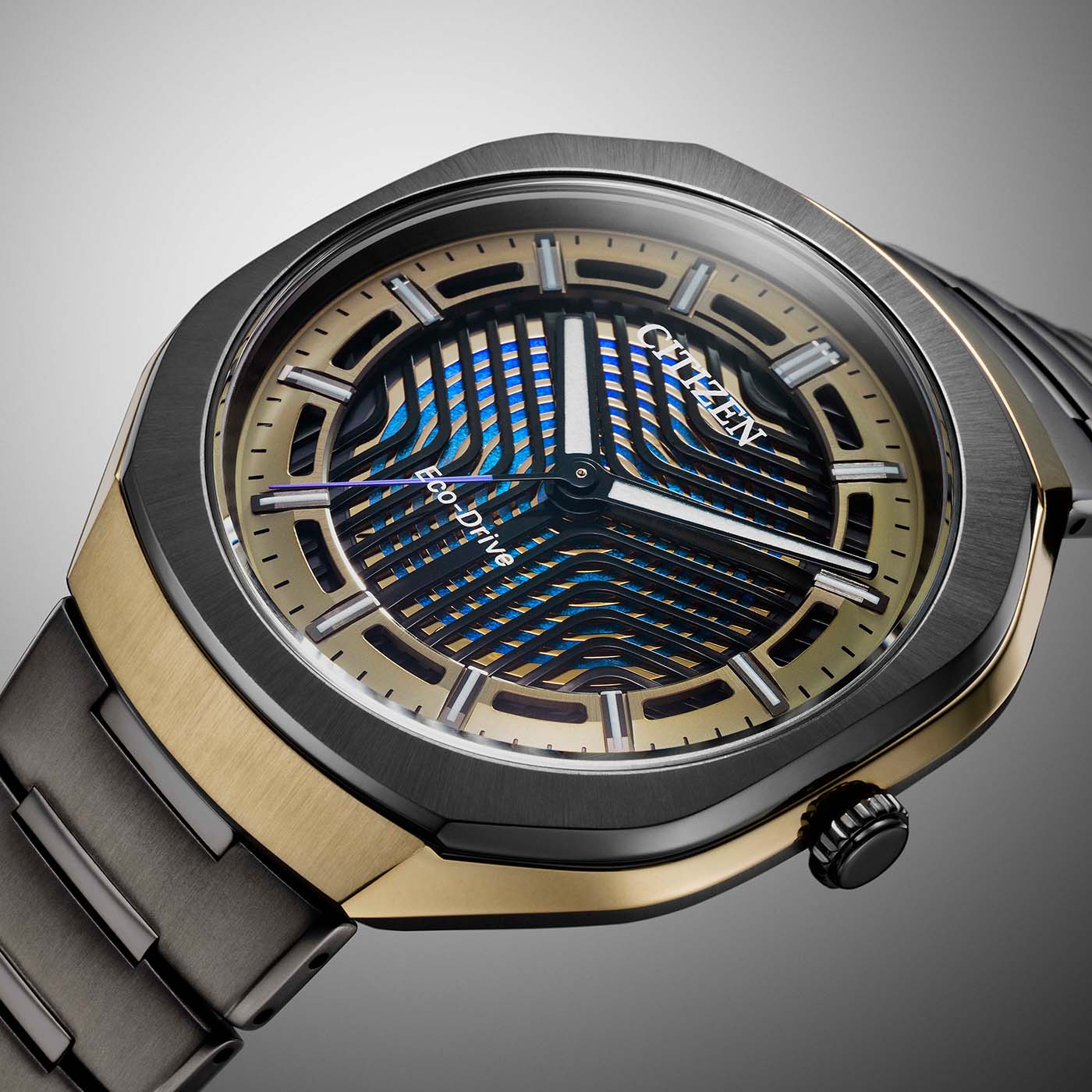 Citizen Eco-Drive Photon BJ6569-59X 39,6 mm, lunette gris foncé, carrure dorée, anneau doré sur le cadran de métal noir fendu et trotteuse violette
