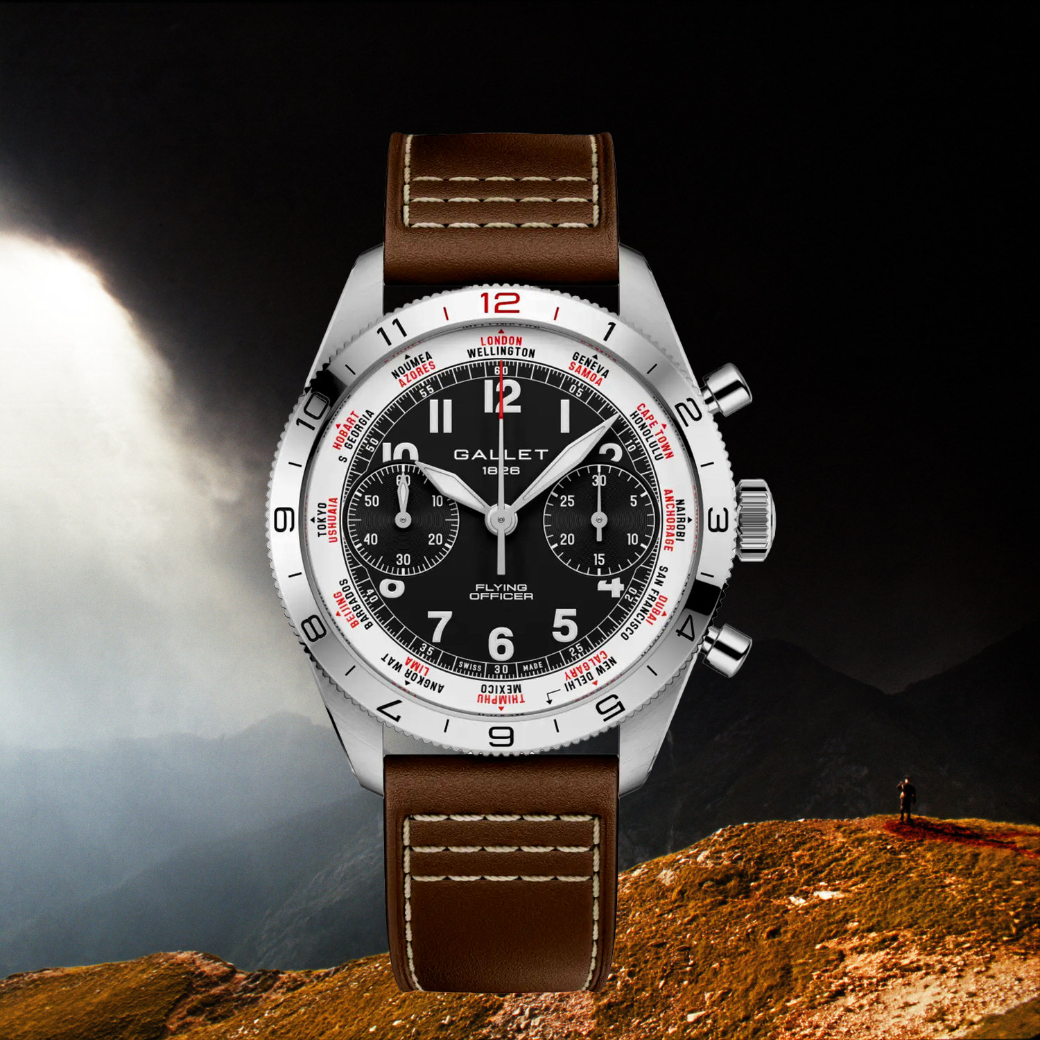 Montre Gallet Flying Officer Chronograph 40 mm sur bracelet cuir brun, devant une crête de montagne où éclate un orage