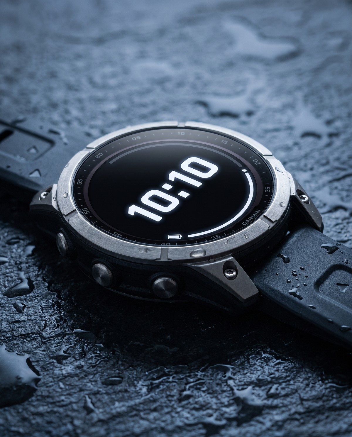Détail du boîtier titane et de la lunette d'une Garmin fēnix 9 Pro 47 mm (vue d'illustration)
